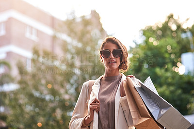 Buy stock photo Portrait, shopping bags or rich woman in city or urban street for boutique retail sale or clothes in sunglasses. Smile, client or fashionable girl customer on city road walking with luxury products 