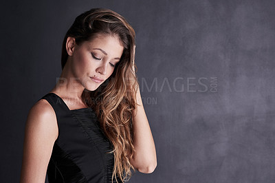 Buy stock photo Hair, beauty and woman in studio with shampoo, cosmetics or texture results on grey background. Haircare, mockup and model with shine, glow or treatment, growth and color satisfaction posing isolated