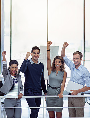 Buy stock photo Portrait of a group of colleagues celebrating together in an office