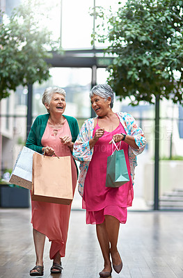 Buy stock photo Full length shot of a two senior women out on a shopping spree