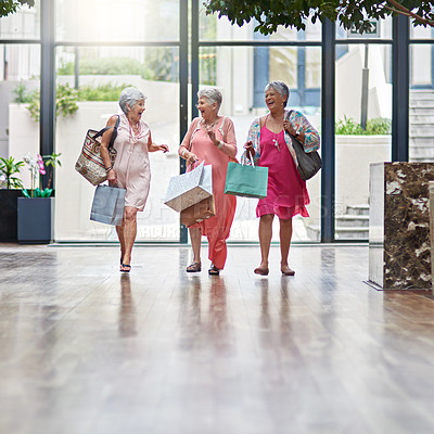 Buy stock photo Full length shot of a three senior women out on a shopping spree
