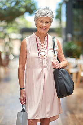 Buy stock photo Cropped portrait of a senior woman out on a shopping spree
