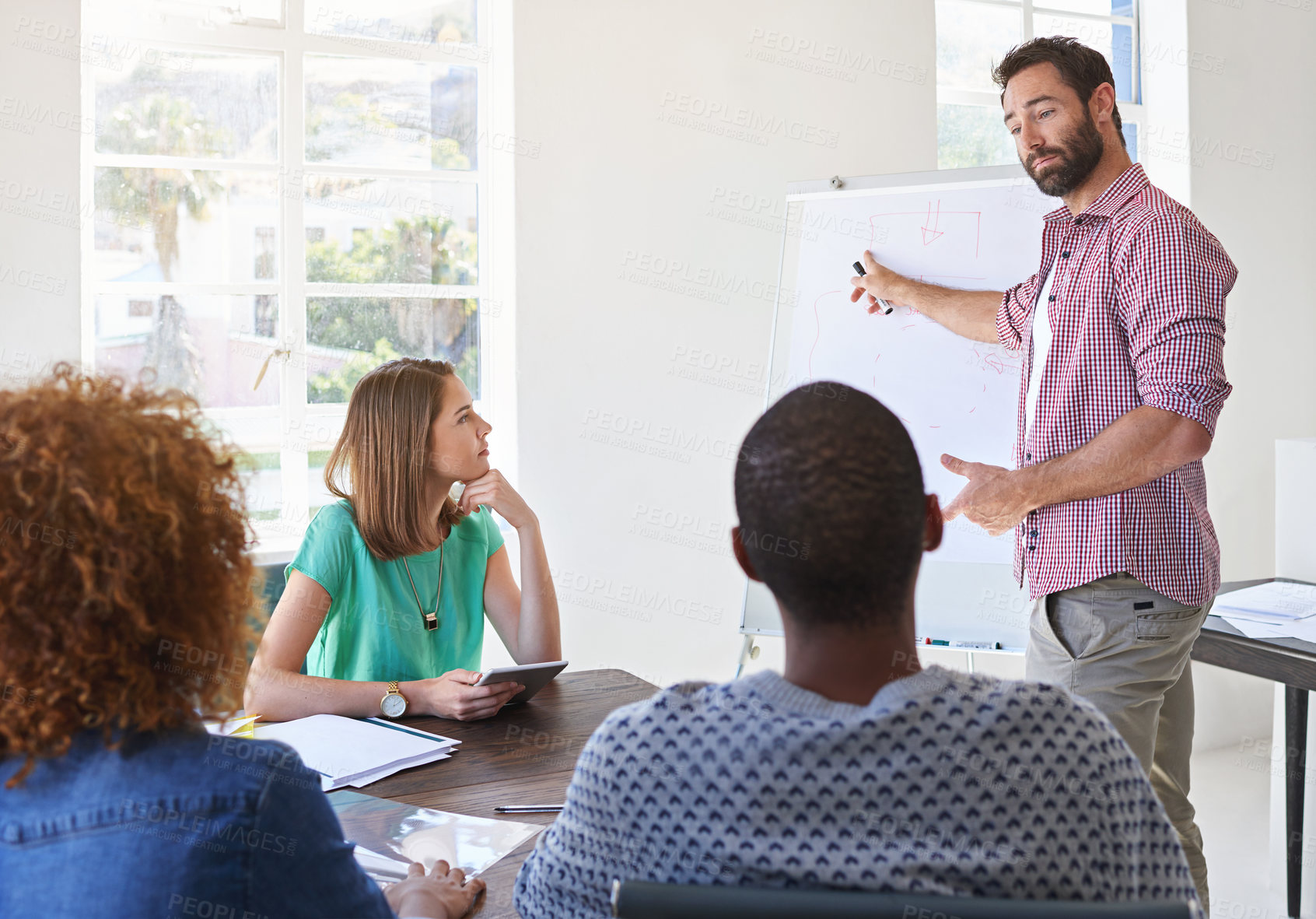 Buy stock photo Man, whiteboard and presentation with team at startup for planning, brainstorming or banner for acquisition process. Person, speaker and crowd in modern office for problem solving at creative agency