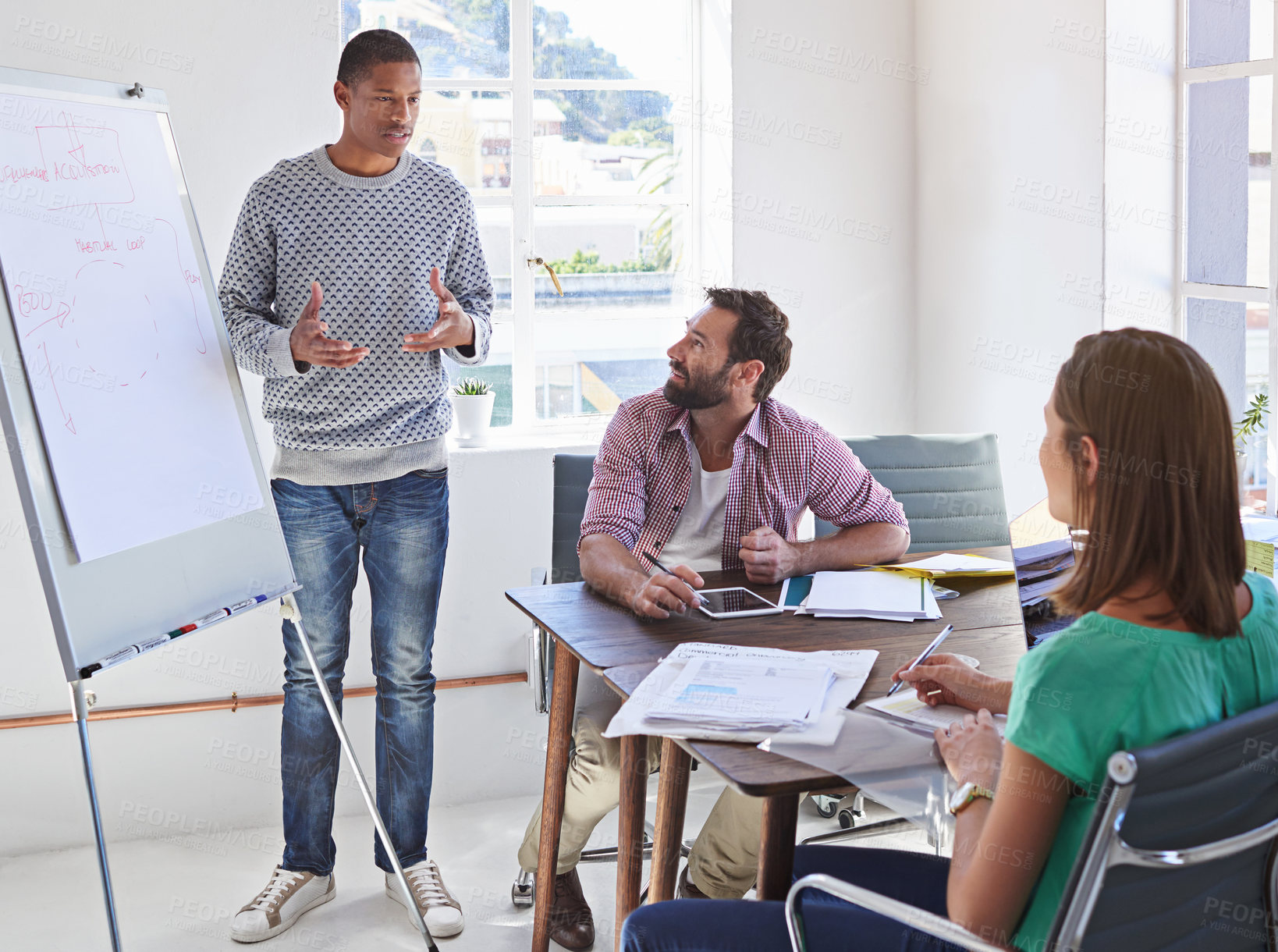 Buy stock photo Man, whiteboard and presentation with discussion at startup for pitch, brainstorming and report for acquisition process. Person, speaker and crowd at office with problem solving at creative agency