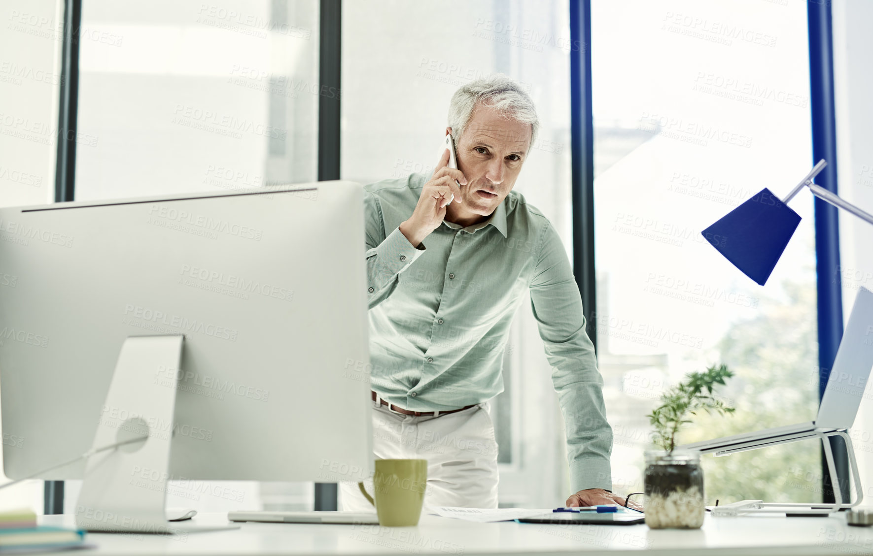 Buy stock photo Portrait, businessman and phone call at office for communication or networking as financial analyst. Mature person, employee and serious with conversation, consultation and connection for advice