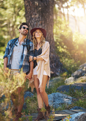 Buy stock photo Full length shot of an affectionate young couple during a hike