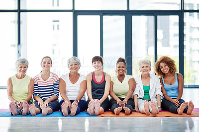 Buy stock photo Shot of a group of women warming up indoors