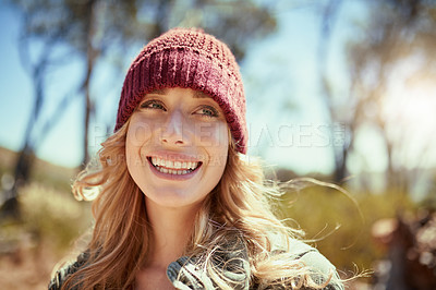Buy stock photo Cropped shot of a young woman hiking