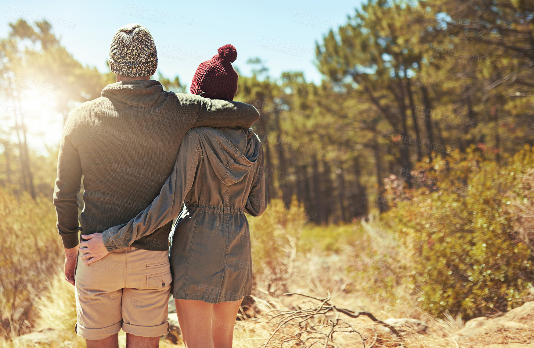 Buy stock photo Back, couple and hiking with hug outdoor with fitness adventure, travel location or romantic nature. People, embrace and support for cardio exercise, calm morning and bonding of forest view in summer