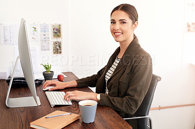 Buy stock photo Cropped portrait of a young businesswoman working in her office