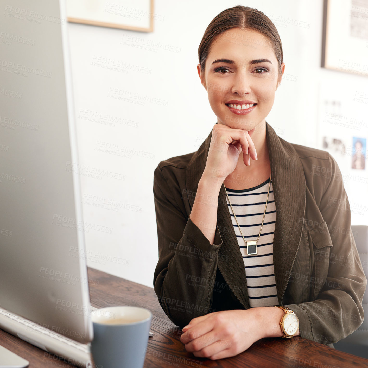 Buy stock photo Cropped portrait of a young businesswoman working in her office