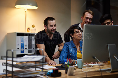 Buy stock photo Shot of employees working in an office at night