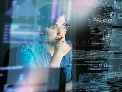 Buy stock photo Cropped shot of a young computer programmer looking through data