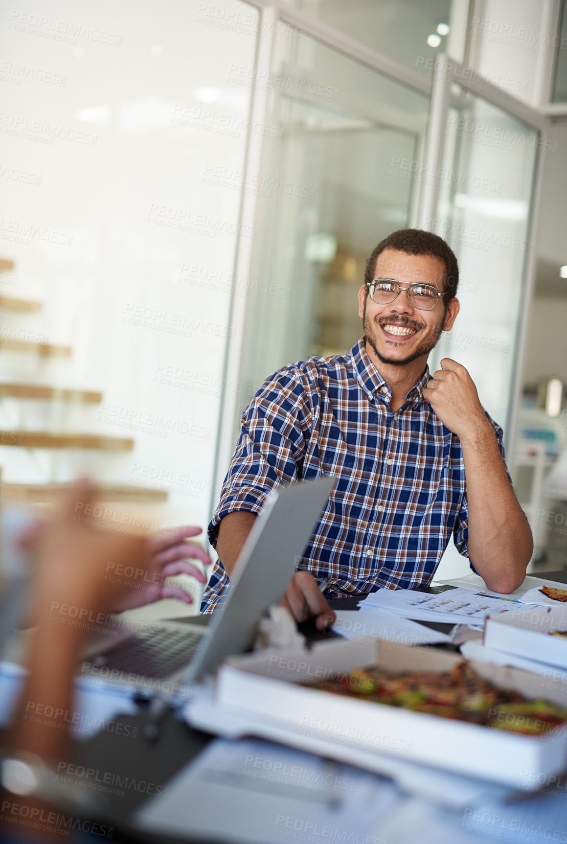 Buy stock photo Happy, office and business man in meeting for planning, teamwork and collaboration. Creative agency, company and workers laugh with documents, laptop and pizza in discussion, review and feedback