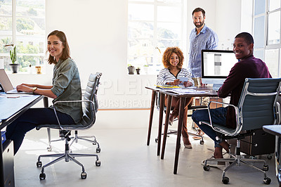 Buy stock photo Portrait of a team of colleagues working in an open plan office