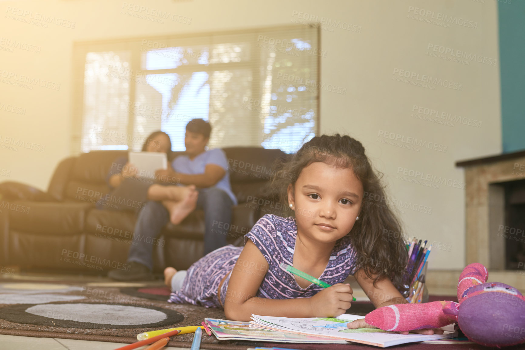 Buy stock photo Portrait of a family relaxing in a lounge at home