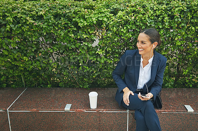 Buy stock photo Shot of a modern businesswoman outdoors