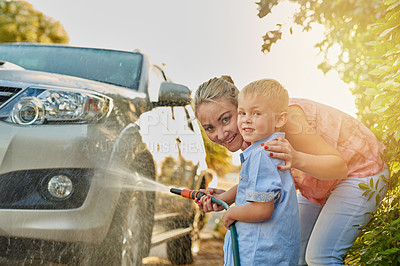 Buy stock photo Family, portrait and washing car with water in driveway for bonding, chores or responsibility. Happy, love or smile with mother and son cleaning vehicle outdoor together for development in summer
