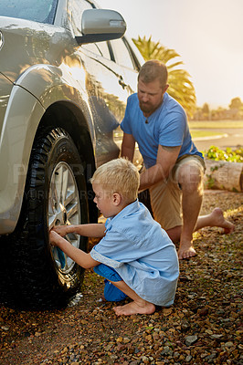 Buy stock photo Outdoors, man and child with cleaning car in nature for teamwork, maintenance and childhood development. Dad, boy and kid with washing vehicle on ground for teaching, hygiene and help in parenthood