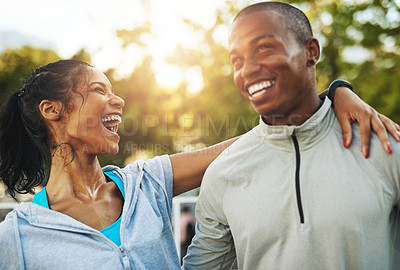 Buy stock photo Shot of a young sporty couple out for a workout