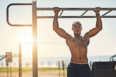 Buy stock photo Portrait of a young sporty man exercising outside
