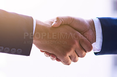 Buy stock photo Shot of two businesspeople shaking hands