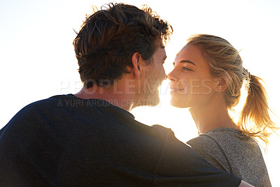 Buy stock photo Shot of a loving couple looking into each other's eyes