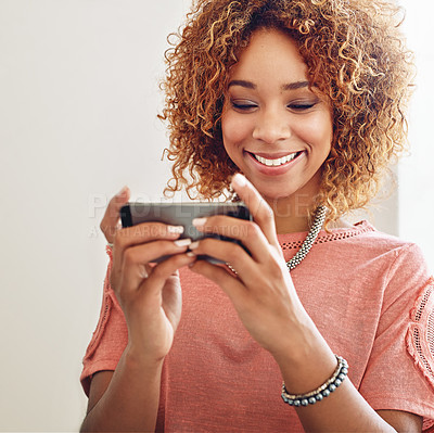 Buy stock photo Phone games, relax or happy woman on break playing online gaming, subscription or connection. Designer, video gamer or African person with mobile app in workplace for streaming multimedia with smile