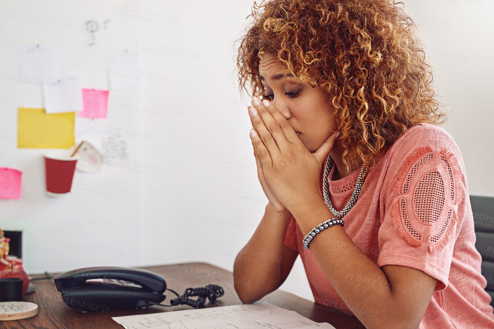 Buy stock photo Cropped shot of a businesswoman looking stressed out at her desk