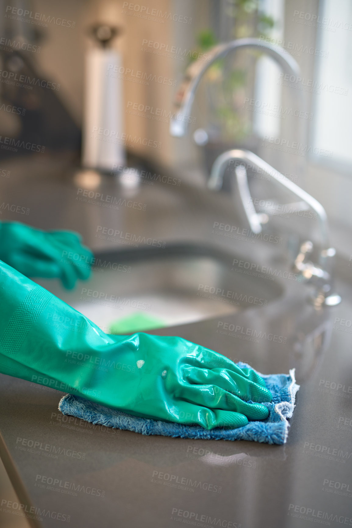 Buy stock photo Hand, glove and kitchen with sink, cleaning and home routine for hygiene and responsibility. Housekeeping, faucet and washing for countertop, polishing and cloth for scrub with domestic housework