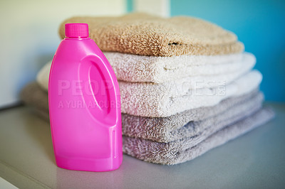 Buy stock photo Towels, detergent and washing laundry cleaning or chemical for cotton bacteria, product or household. Cloth, sanitary and folded for neat organizing or linen with soap as service, stack or hygiene