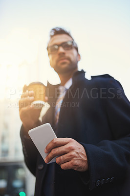 Buy stock photo Business man, travel and mobile with coffee in city for networking, communication and social media. Lawyer, glasses and walking with phone in urban for news, website and conversation in low angle