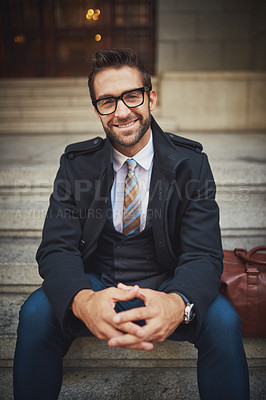 Buy stock photo Portrait of a stylish young man sitting on steps in the city