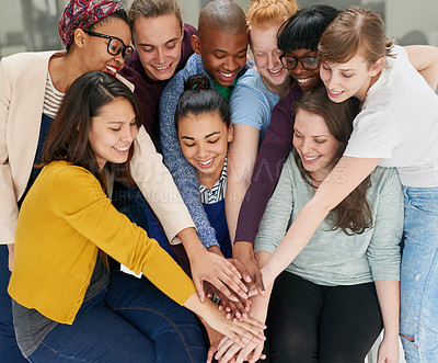 Buy stock photo Happy, teamwork and business people with stack of hands in office for achievement or motivation. Smile, collaboration and group of creative designers with support gesture for synergy in workplace.