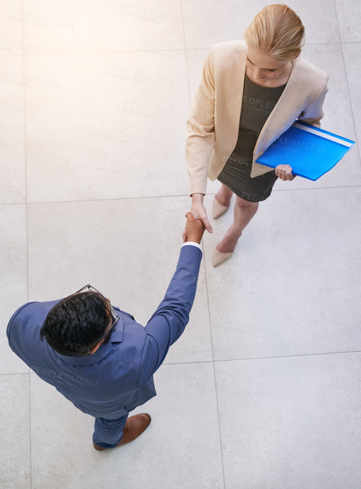 Buy stock photo Shot of two businesspeople shaking hands