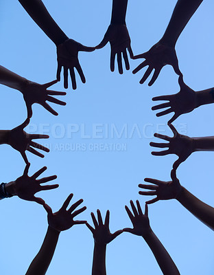 Buy stock photo Hands, group and silhouette for support huddle, low angle of collaboration for team building and people outdoor. Partnership, solidarity and community together on sky background, synergy and trust