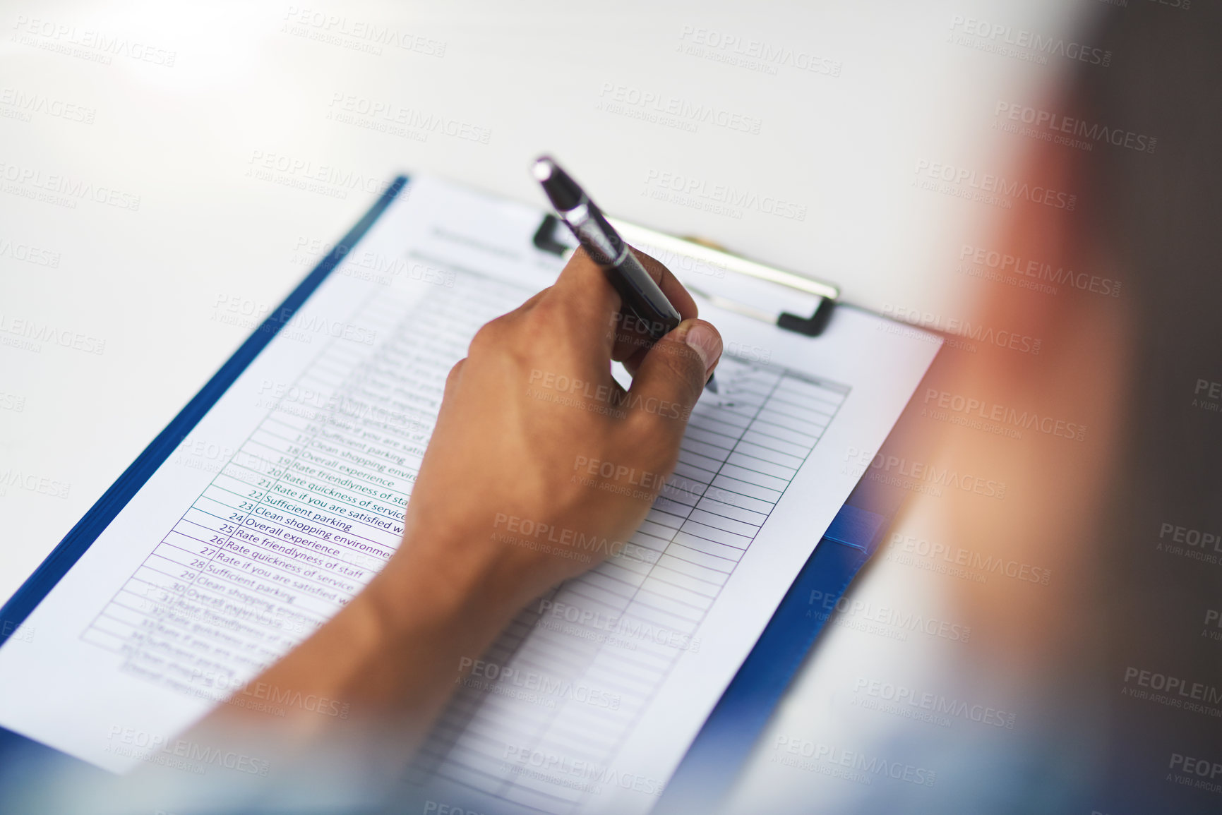 Buy stock photo Shot of a person filling in a form