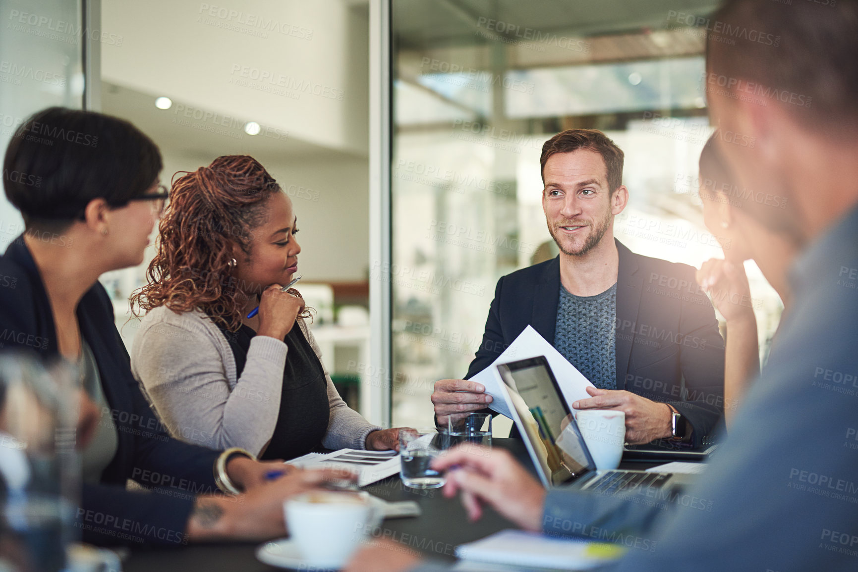 Buy stock photo Documents, meeting and review with business people in boardroom of office for collaboration. Diversity, feedback and report with employee team at table in corporate workplace for company discussion