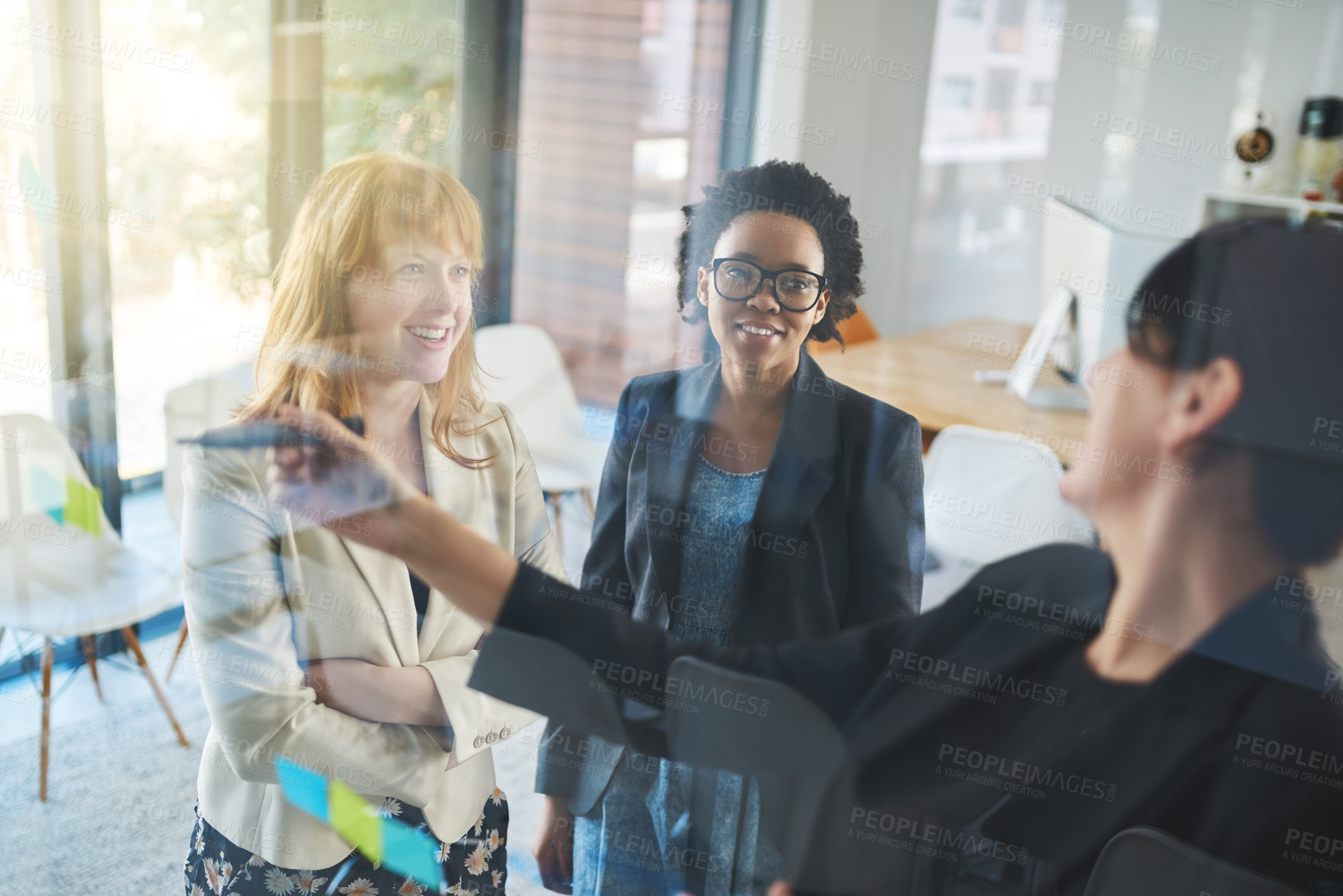 Buy stock photo Happy women, teamwork and brainstorming notes on window for schedule, mindmap and planning goals, agenda or solution. Diversity, collaboration and ideas on glass of innovation, objectives and mission