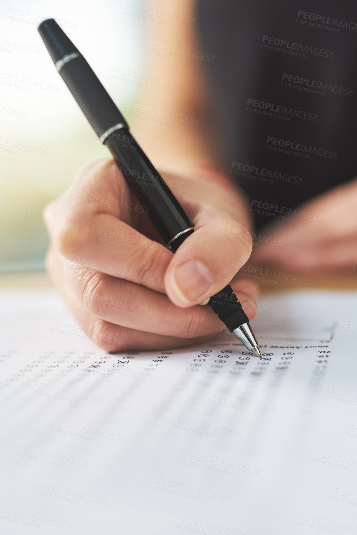 Buy stock photo Hand, pen and paper for test, exam or choice for mcq, study and quiz for student, education or learning. Person, write or answer sheet on desk for assessment, tick for documentation for complete mark