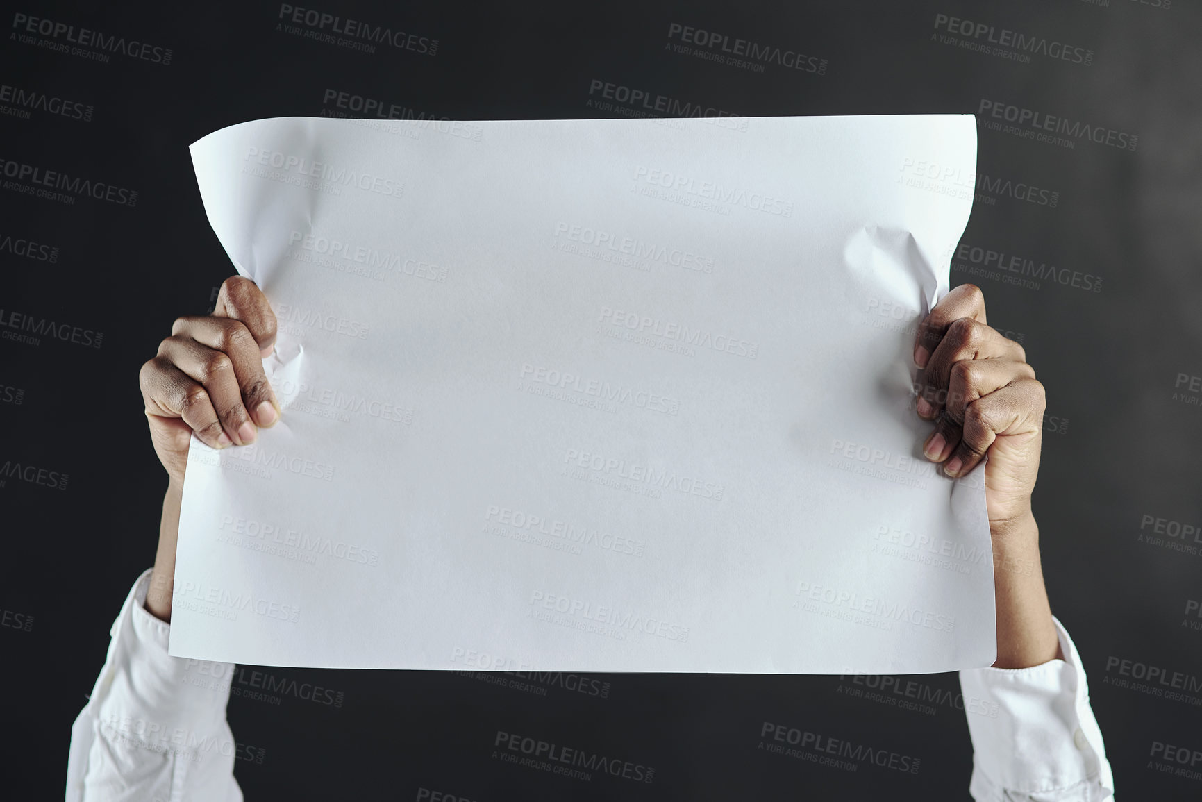 Buy stock photo Hands, business and person with blank paper, showing and promotion on dark background. Employee, worker and consultant with poster, opportunity and share info with mockup space, feedback and signage