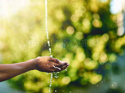 Buy stock photo Closeup of hands catching fresh water outdoors, having fun in nature and practicing good hygiene. Person washing their fingers in a clean stream, enjoying splashing and refreshing germ free hydration