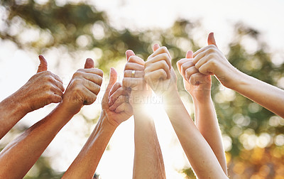Buy stock photo Group, thumbs up and hands outdoor for success, winning or celebration together on sun flare. Team, fingers and like gesture for support, collaboration or solidarity of community in nature on bokeh