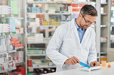 Buy stock photo Pharmacist man, store and counting with pills, medicine and  focus for health, product or sales. Medical professional, pharma expert or sorting medication in pharmacy for wellness, healthcare and job