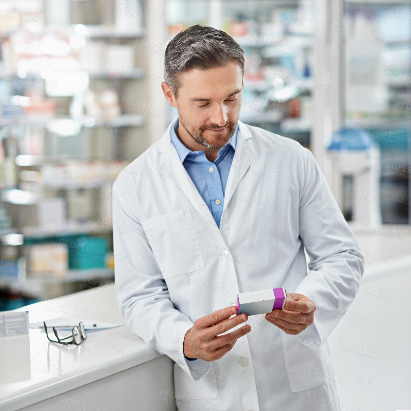 Buy stock photo Pharmacy, inventory and pharmacist man with medicine, stock supplier check and healthcare industry. Product, tablet box or medical pills of retail worker in reading label or quality assurance expert