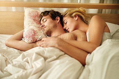 Buy stock photo Cuddle, sleeping and romance with couple in bedroom for love, valentines day and marriage. Honeymoon, getaway and care with man and woman at home or staycation for anniversary retreat and relax