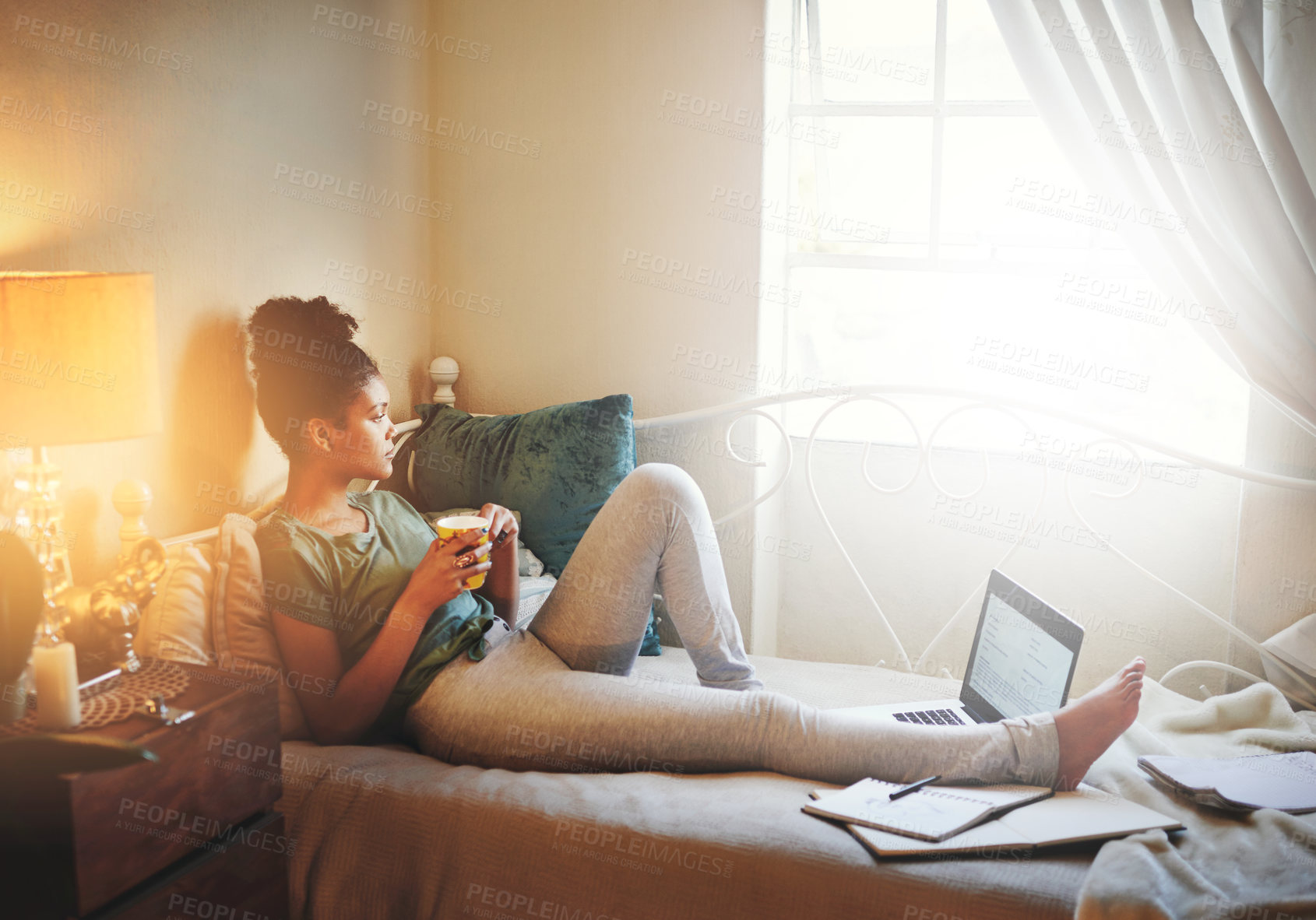 Buy stock photo Full length shot of a young female student studying at home