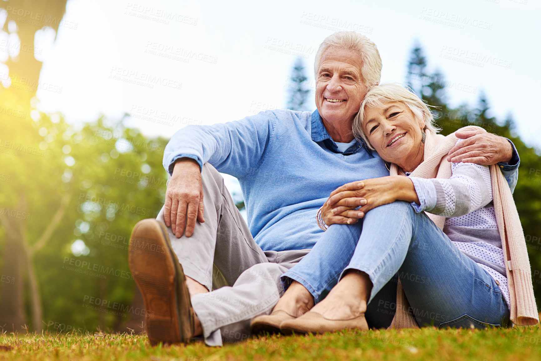 Buy stock photo Portrait of a senior couple enjoying the day together in a park