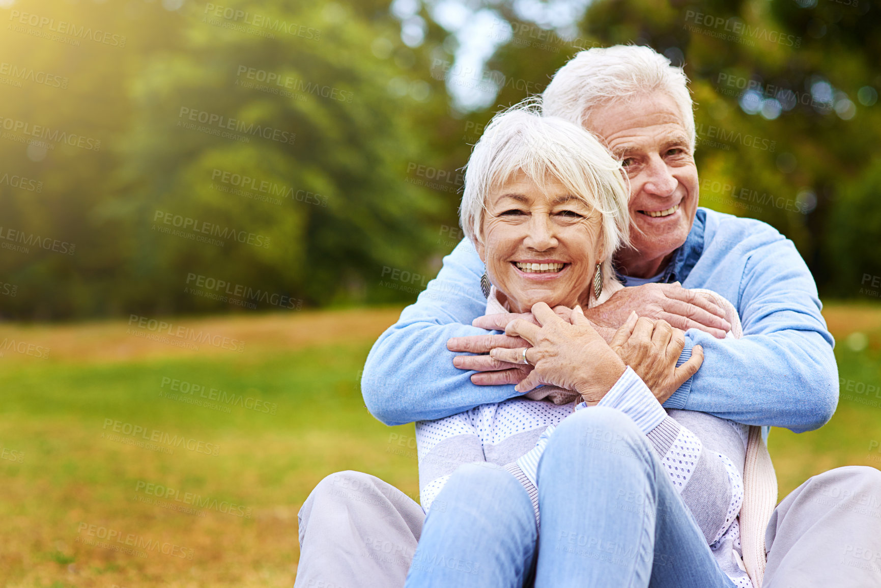 Buy stock photo Portrait of a senior couple enjoying the day together in a park