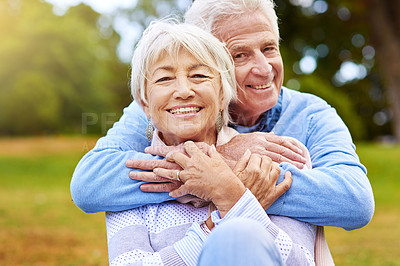 Buy stock photo Portrait of a senior couple enjoying the day together in a park